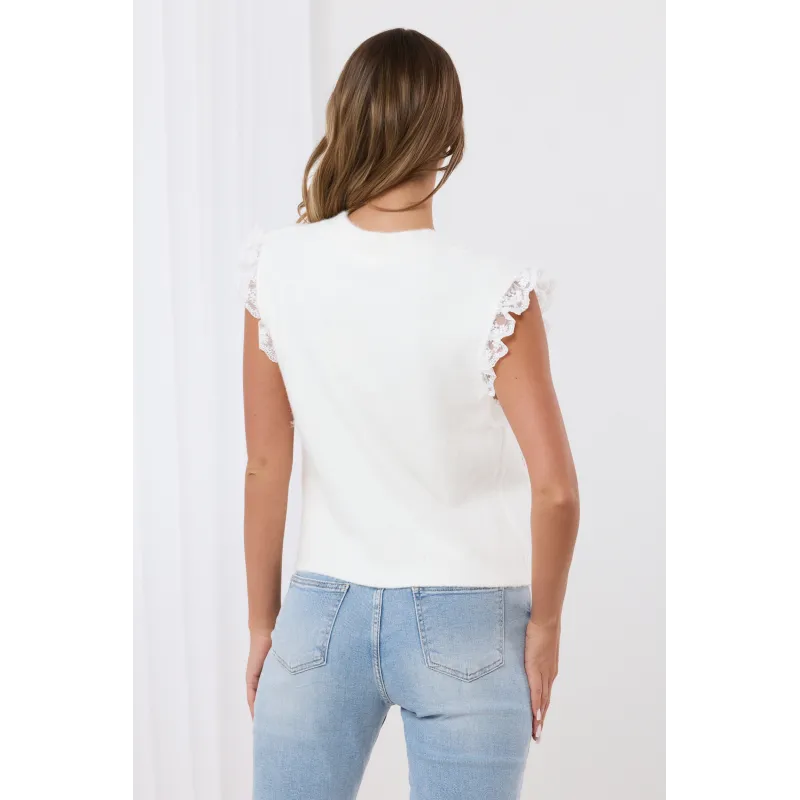 Dzianinowy sweterek bez rękawów z haftowanymi różami