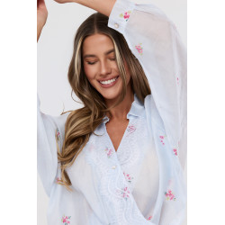 Bluzka kopertowa z motywem kwiatowym i koronkowym wykończeniem