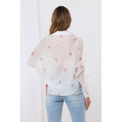 Bluzka kopertowa z motywem kwiatowym i koronkowym wykończeniem