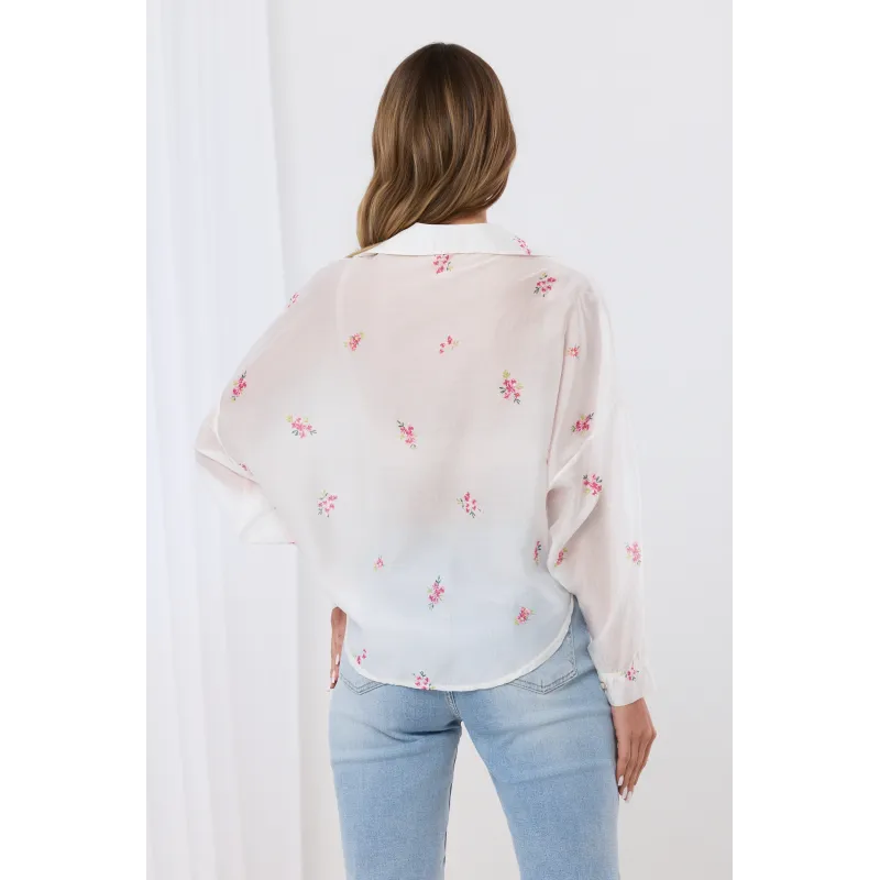 Bluzka kopertowa z motywem kwiatowym i koronkowym wykończeniem