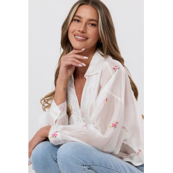 Bluzka kopertowa z motywem kwiatowym i koronkowym wykończeniem