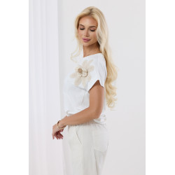 Bluzka z ozdobnym kwiatem na ramieniu