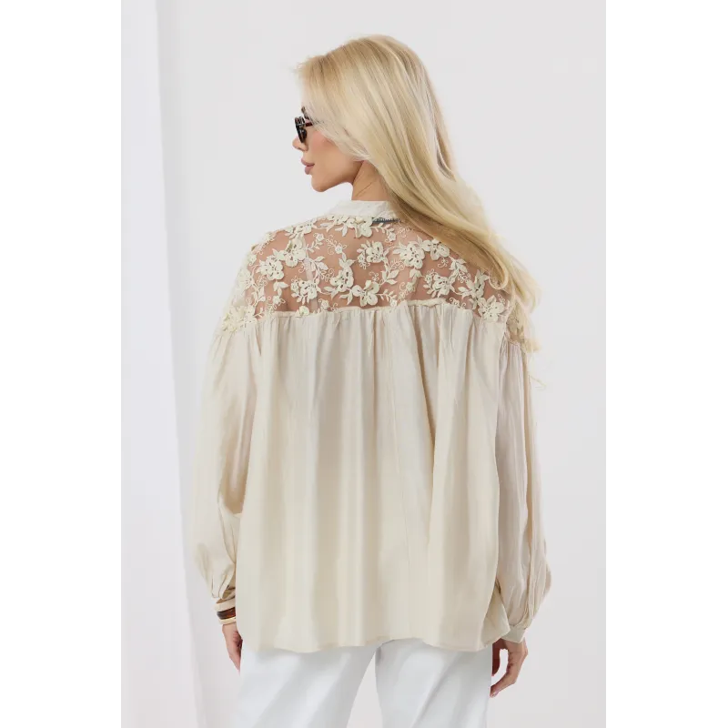 Bluzka z koronkowymi wstawkami na ramionach