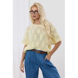 Luźny sweter z szerokimi rękawami i ozdobnym splotem