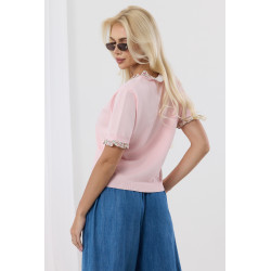 Sweterek z kwiatowymi falbankami przy dekolcie i rękawach