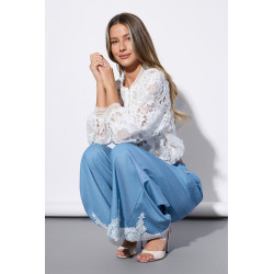 Spodnie palazzo z haftowanym dołem i wiązaniem