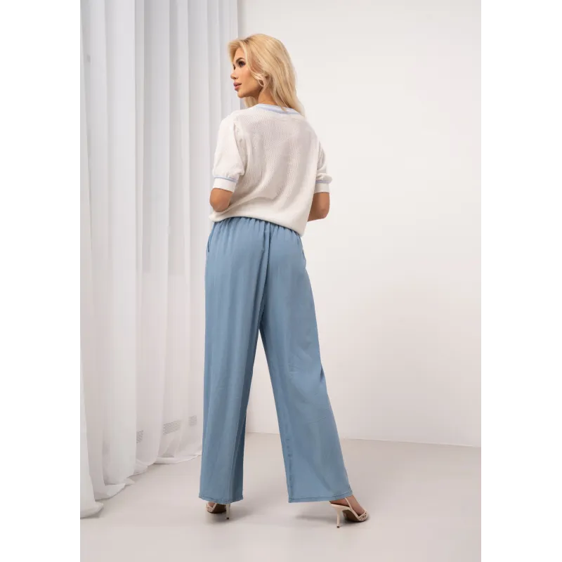 Luźne spodnie jeansowe z gumką i wiązaniem w pasie