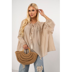 Muślinowa bluzka z biżuteryjnym wykończeniem