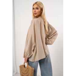 Muślinowa bluzka z biżuteryjnym wykończeniem