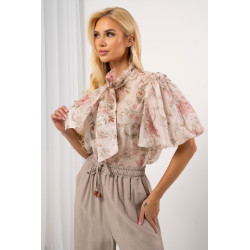 Bluzka w kwiaty z wiązaniem pod szyją i bufiastymi rękawami | Sprzedaż hurtowa odzieży damskiej