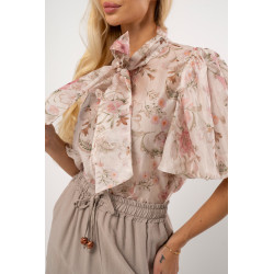 Bluzka w kwiaty z wiązaniem pod szyją i bufiastymi rękawami | Sprzedaż hurtowa odzieży damskiej