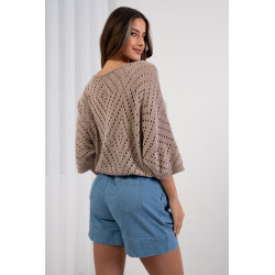 Ażurowy sweter o luźnym kroju