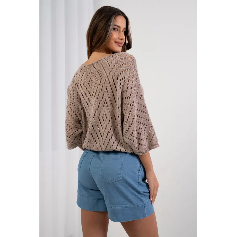 Ażurowy sweter o luźnym kroju