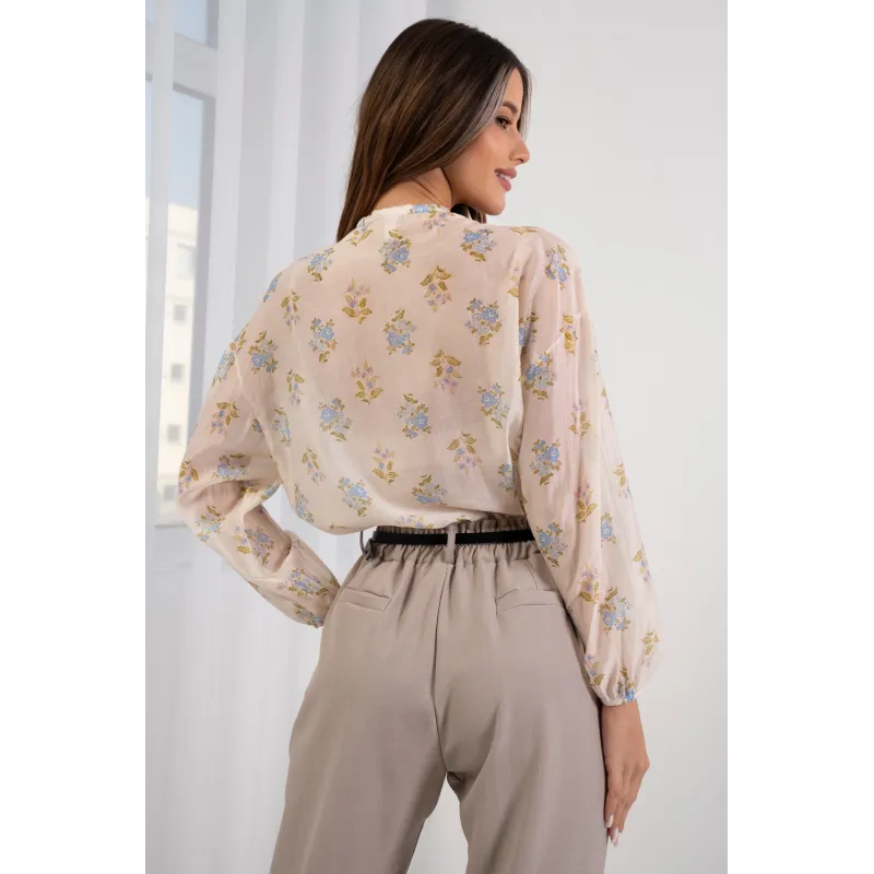 Lekka bluzka w kwiaty z falbanami