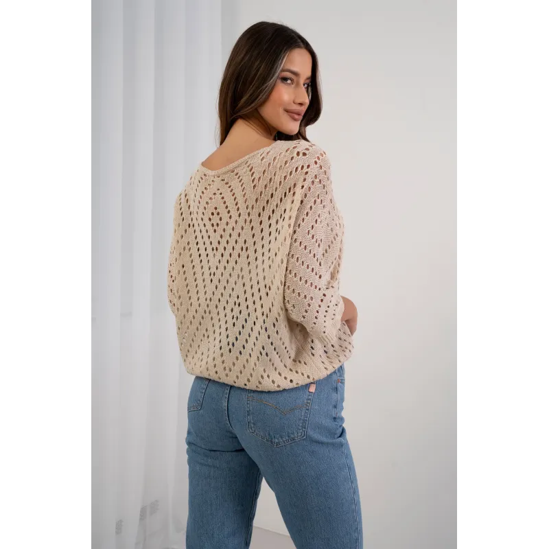 Ażurowy sweter o luźnym kroju