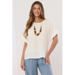 Bluzka o kroju oversize z ozdobnym naszyjnikiem