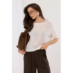 Sweter z rękawami typu nietoperz i ozdobną kokardą na plecach