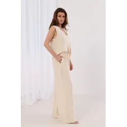 Komplet z asymetryczną bluzką z koronką i szerokimi spodniami