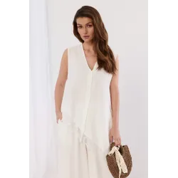 Komplet z asymetryczną bluzką z koronką i szerokimi spodniami