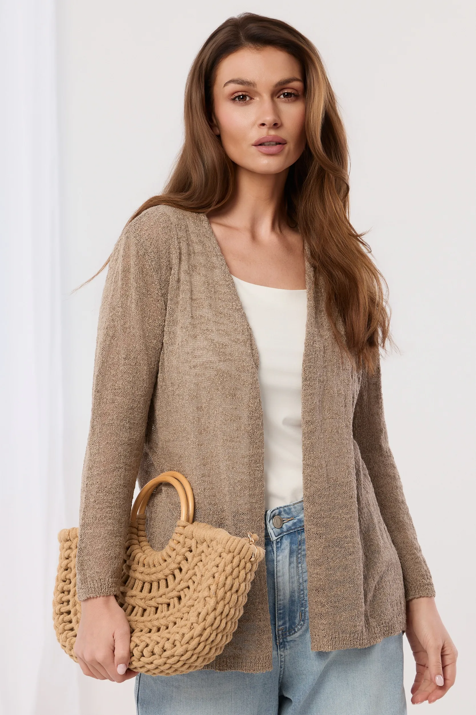 Kardigan o lekkim splocie