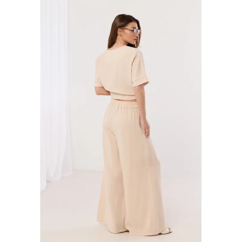 Komplet casualowy z luźną bluzką i spodniami palazzo