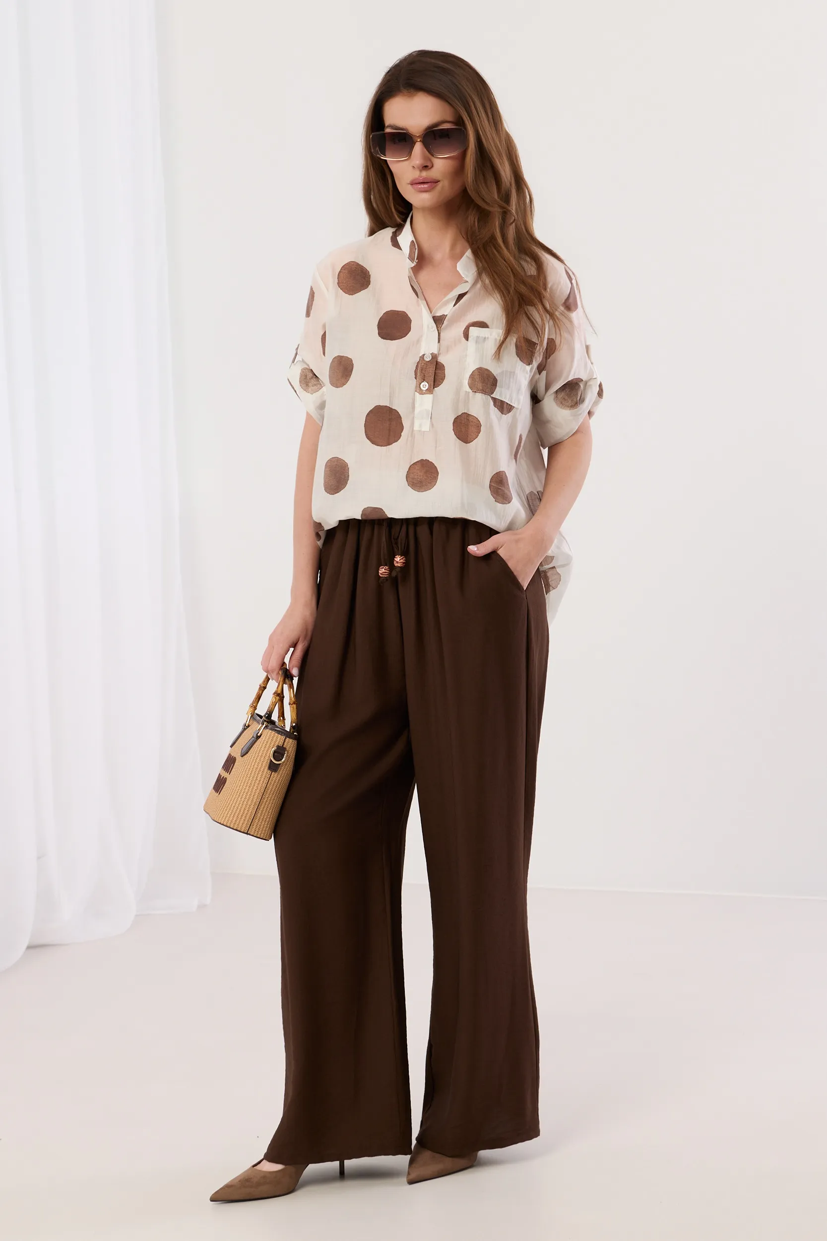 Spodnie typu palazzo z ozdobnym sznurkiem | Hurtownia odzieży damskiej online