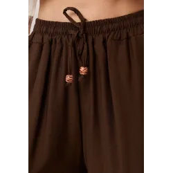 Spodnie typu palazzo z ozdobnym sznurkiem | Hurtownia odzieży damskiej online