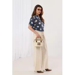 Spodnie typu palazzo z ozdobnym sznurkiem | Hurtownia odzieży damskiej online