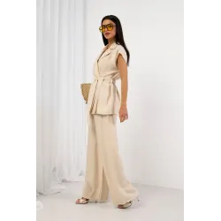 Wisozowy komplet z taliowaną bluzką z wiązaniem i szerokimi spodniami