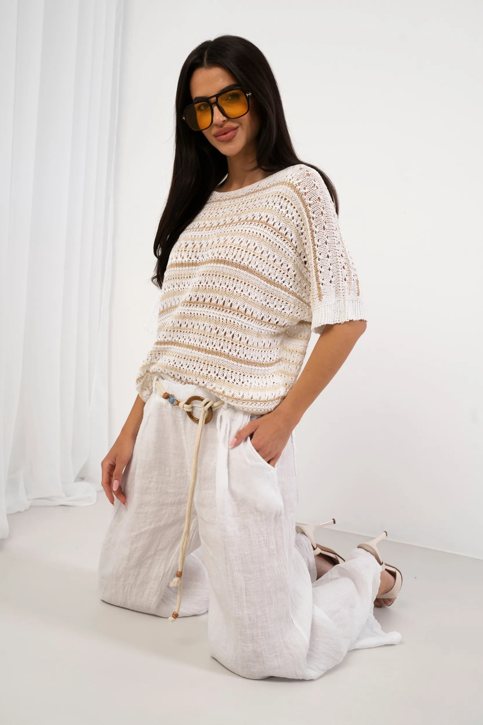 Ażurowy sweter w paski z błyszczącą nitką