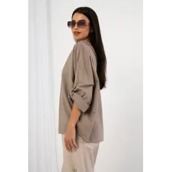 Bluzka oversize z ozdobną koronką na plecach