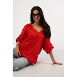 Bluzka oversize z ozdobną koronką na plecach