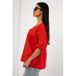 Bluzka oversize z ozdobną koronką na plecach