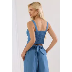 Komplet z topem gorsetowym i szerokimi spodniami z haftowanym dołem