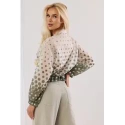 Transparentna kurtka w kropki z ozdobnym ściągaczem