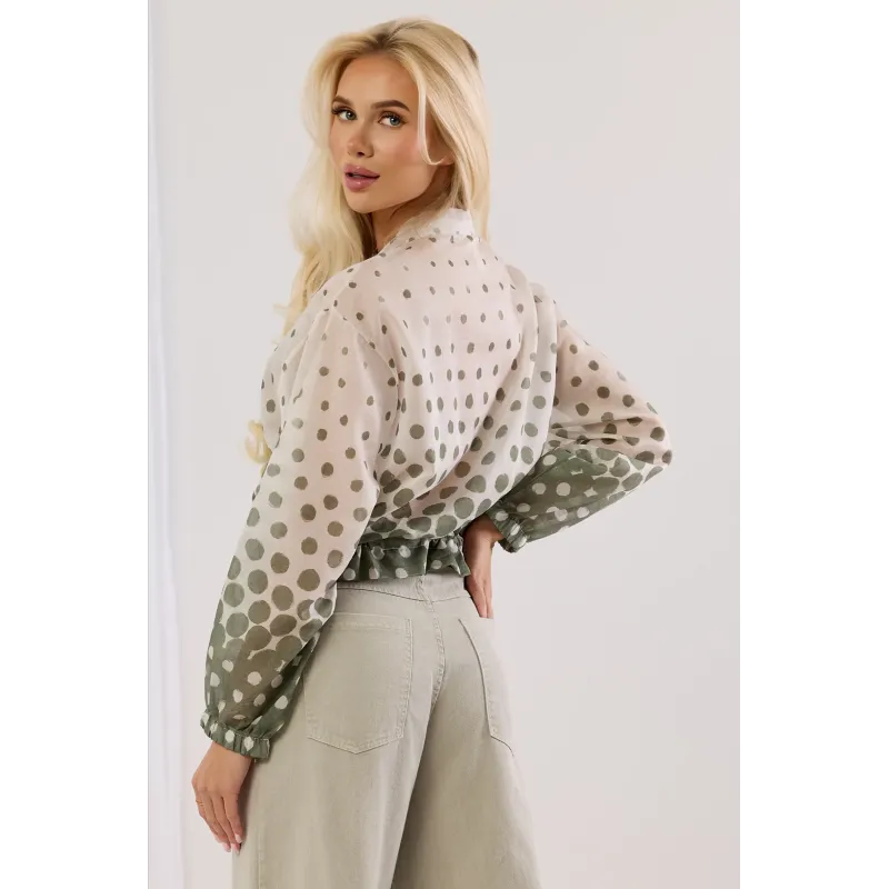 Transparentna kurtka w kropki z ozdobnym ściągaczem