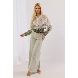 Transparentna kurtka w kropki z ozdobnym ściągaczem