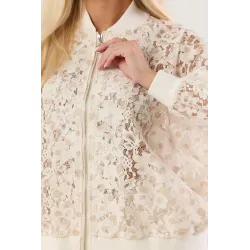 Koronkowa bluza w kropki zapinana na suwak