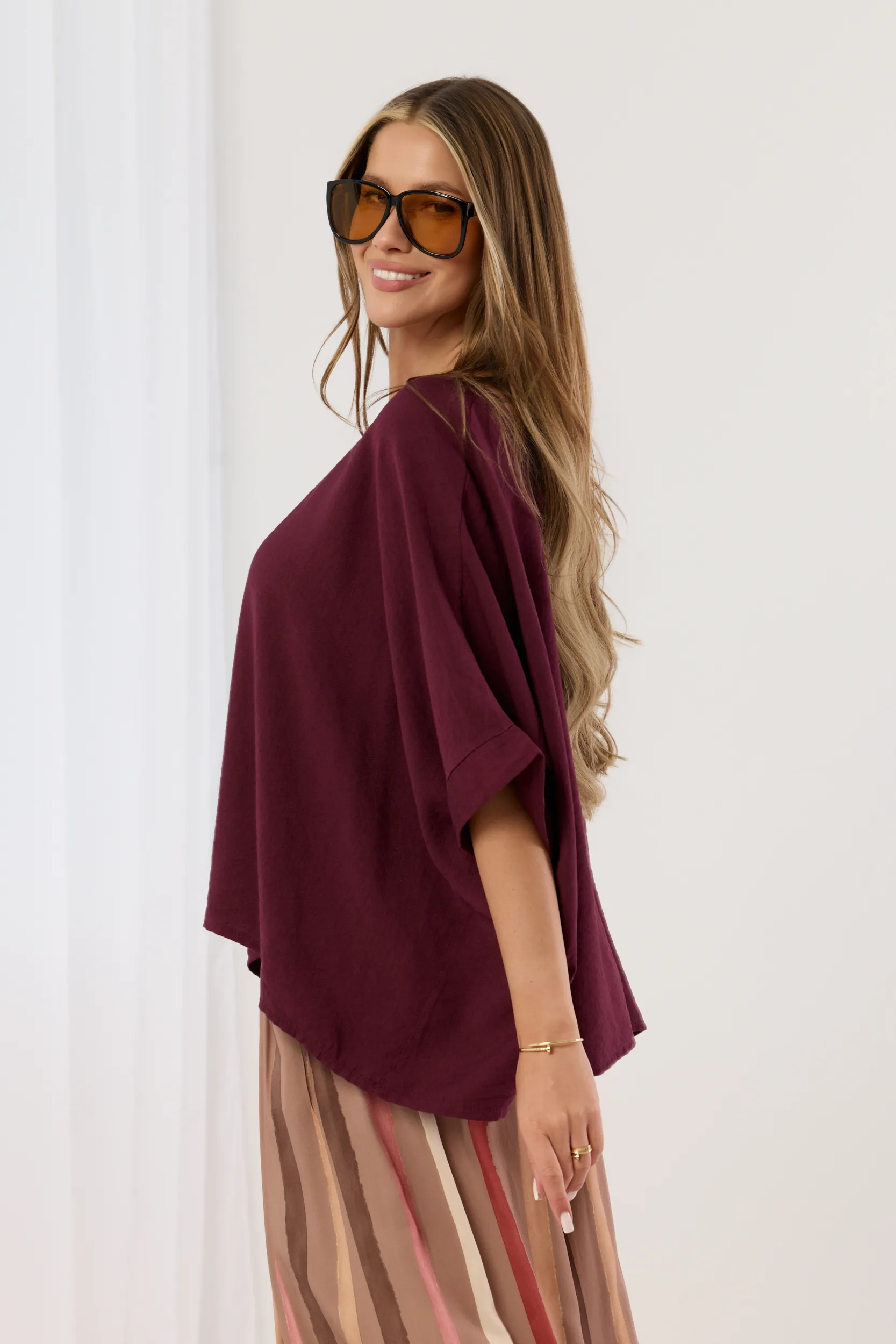 Bluzka oversize z ozdobną kokardą na plecach