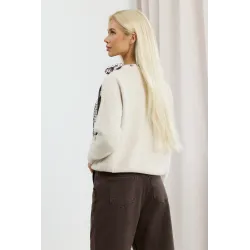 Sweter z ozdobną apaszką wiązaną przy dekolcie