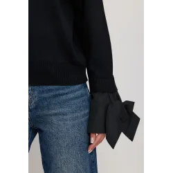Rozpinany sweter z koszulowymi rękawami z kokardami