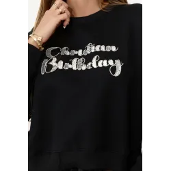 Bluza z błyszczącym napisem z cekinów
