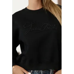 Bluza z ozdobnym napisem z cekinów