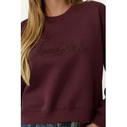 Bluza z ozdobnym napisem z cekinów
