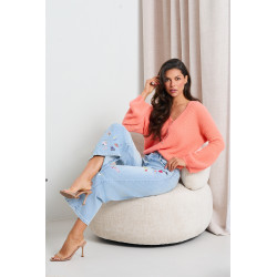 JEANSY O TYPU WIDE LEG Z WIELOMOTYWOWYM NADRUKIEM