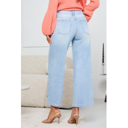 JEANSY O TYPU WIDE LEG Z WIELOMOTYWOWYM NADRUKIEM