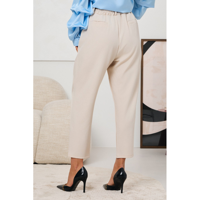 SPODNIE O KROJU CARROT Z PASKIEM