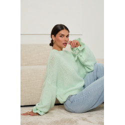 Oversizowy sweter z wiązaniami na rękawach