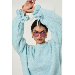 Oversizowy sweter z wiązaniami na rękawach