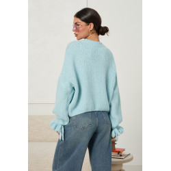 Oversizowy sweter z wiązaniami na rękawach